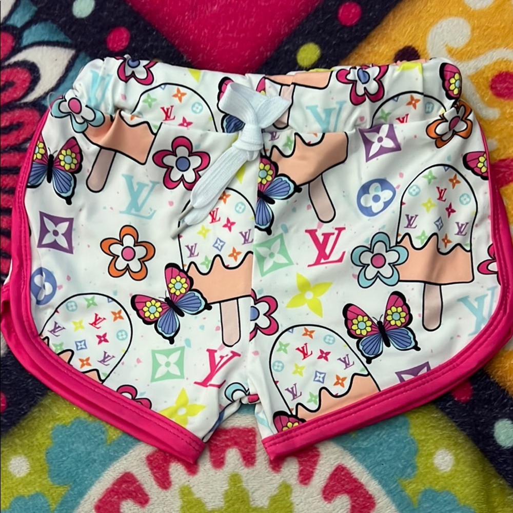 Fashion inspired Cartoon Print Shorts. Girls medium